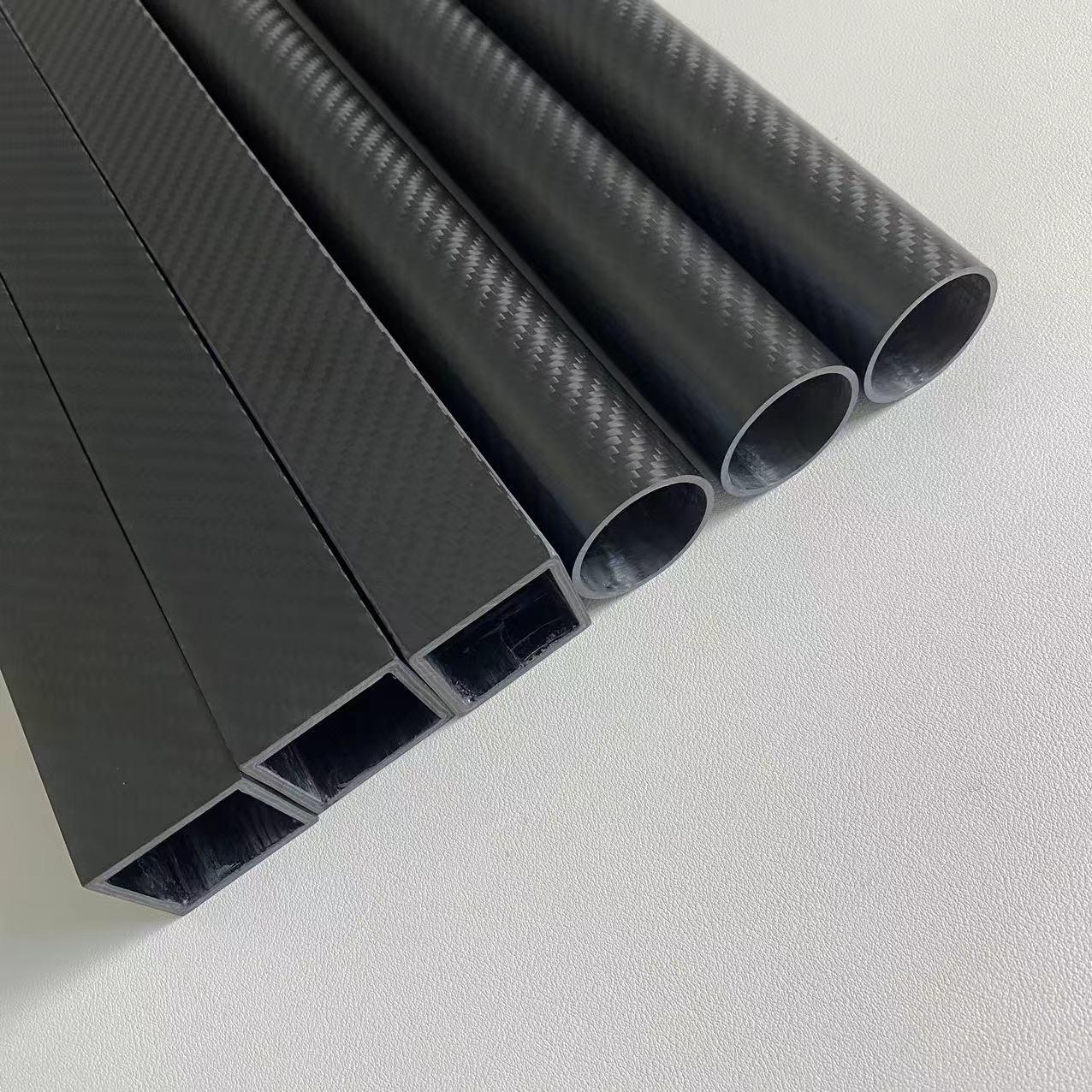 A selection of custom carbon fiber tubes in various shapes and sizes